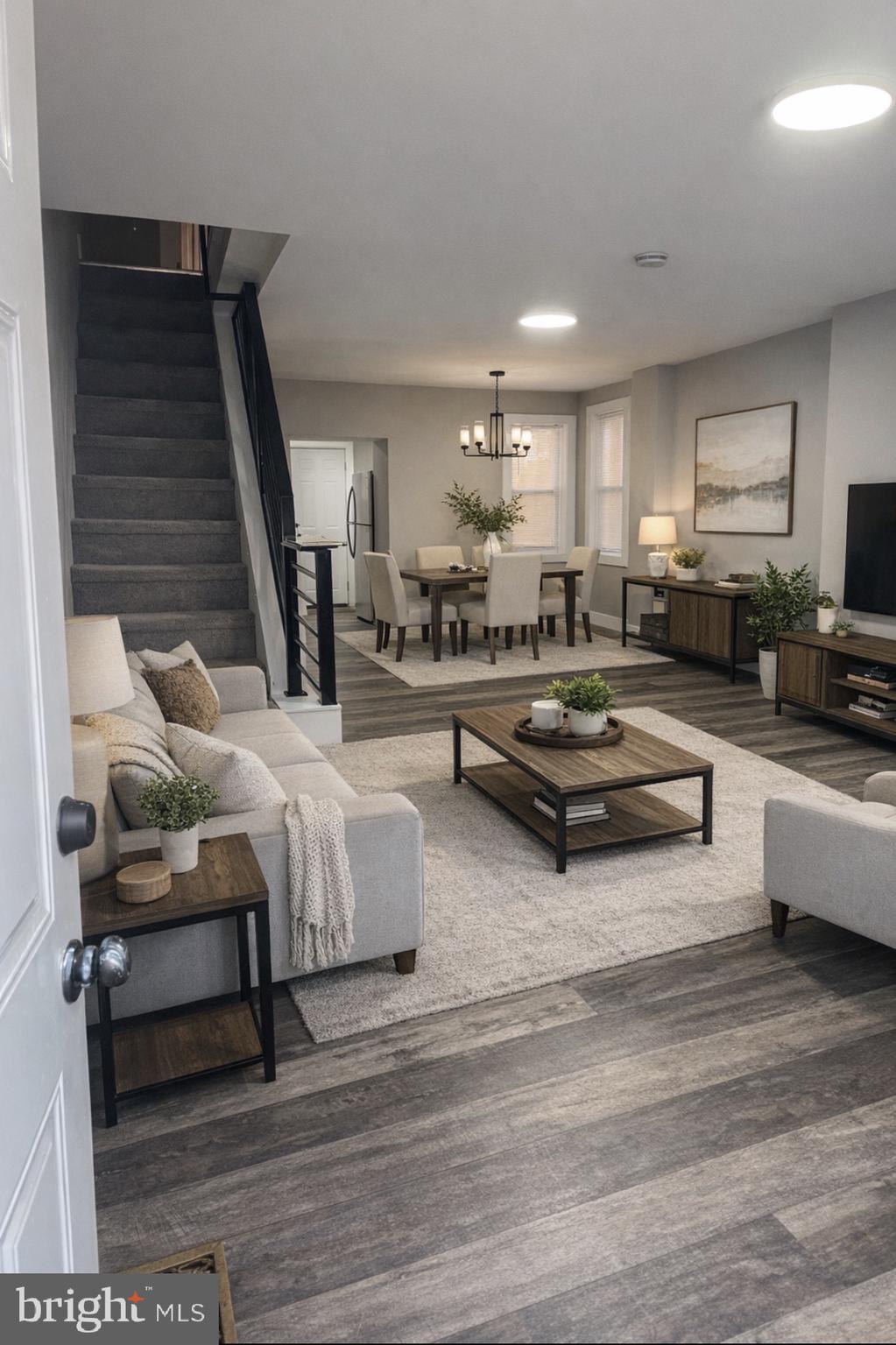 3137 Arbor Street Philadelphia, PA 19134 - Photo 1 of 17 a living room with furniture and a wooden floor