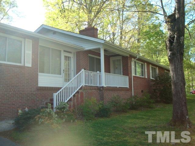 103 Forest Road Oxford, NC 27565 - Photo 14 of 20 a house view with a garden space