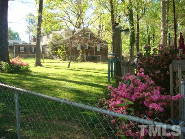 103 Forest Road Oxford, NC 27565 - Photo 15 of 20 a building view with swimming pool and garden