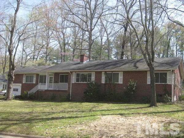 103 Forest Road Oxford, NC 27565 - Photo 16 of 20 a view of a house with a yard