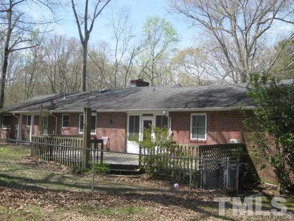 103 Forest Road Oxford, NC 27565 - Photo 17 of 20 a front view of a house with garden