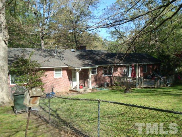 103 Forest Road Oxford, NC 27565 - Photo 20 of 20 a front view of a house with a yard table and chairs