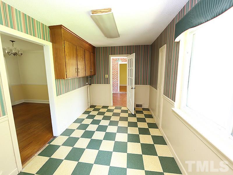 103 Forest Road Oxford, NC 27565 - Photo 6 of 20 a bathroom with a black and white checkered floor