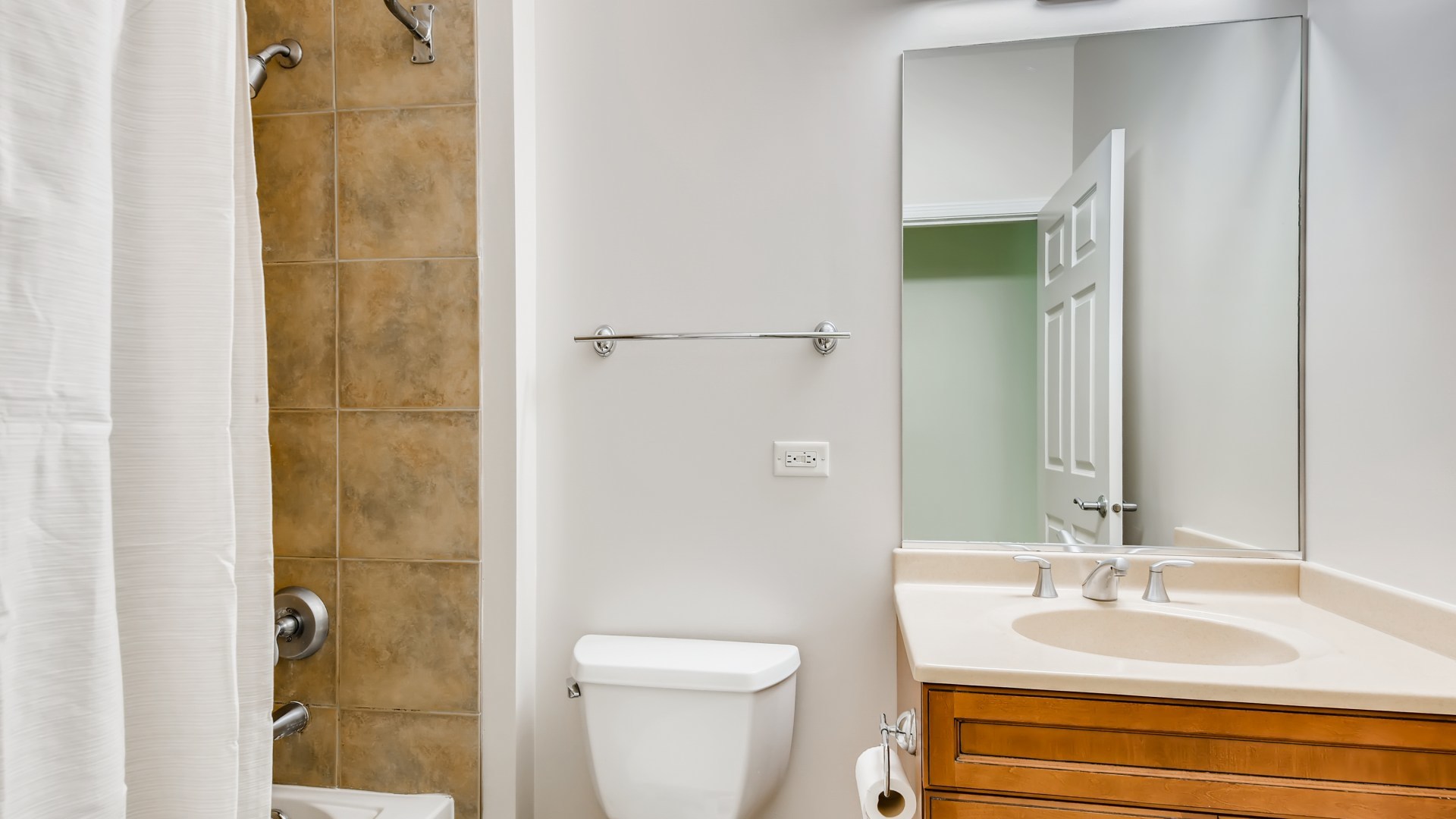 757 West 14th Place, Unit 2B Chicago, IL 60607 - Photo 27 of 32 a bathroom with a granite countertop sink toilet and shower