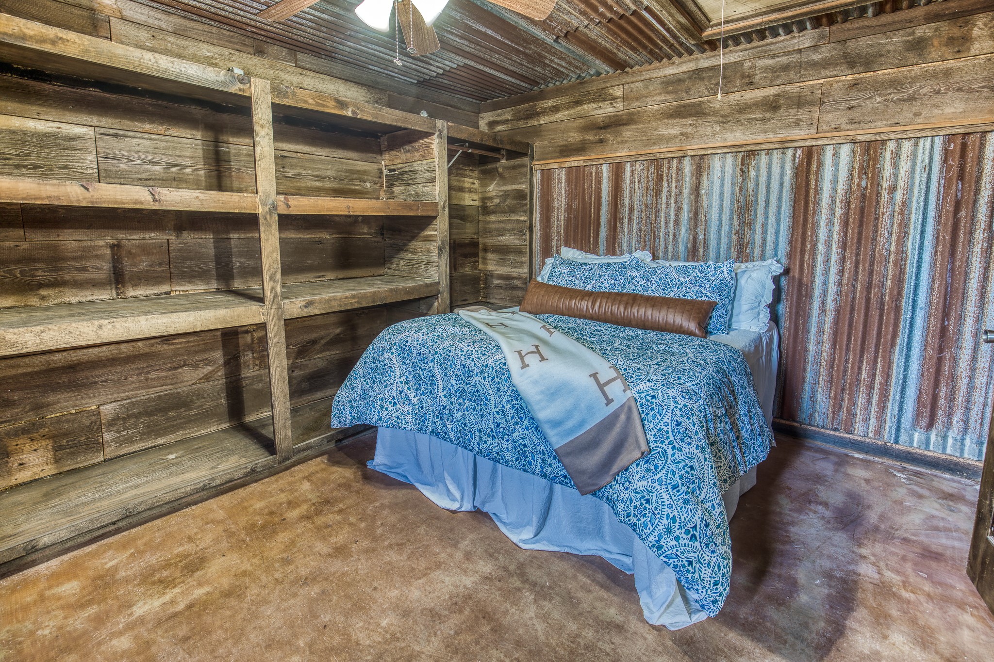 7300 Goehring Road Ledbetter, TX 78946 - Photo 8 of 21 a bed room with a bed and a window