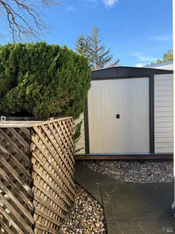a view of a wooden fence