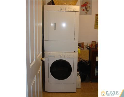 22 Baxter Road Edison, NJ 08817 - Photo 16 of 17 a close view of a utility room with washer and dryer
