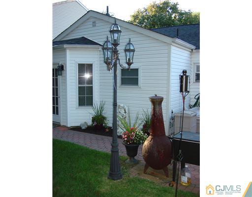 22 Baxter Road Edison, NJ 08817 - Photo 6 of 17 a front view of a house with garden