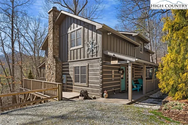 a view of a house with a large window