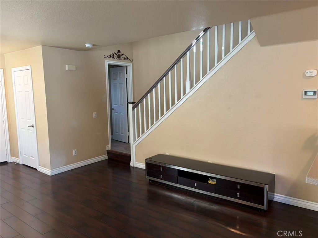 11090 Mountain View Drive, Unit 71 Rancho Cucamonga, CA 91730 - Photo 4 of 24 a view of entryway with wooden floor