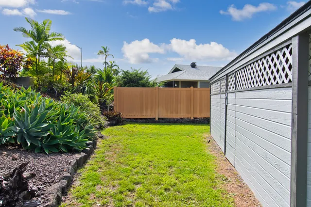 a view of a backyard with garden