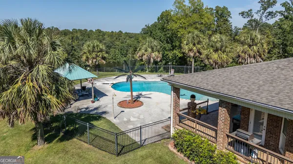 an outdoor space with furniture
