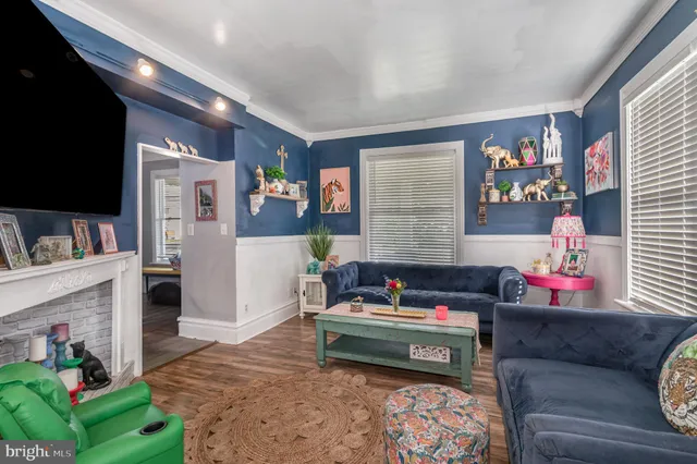 a living room with furniture and a couch