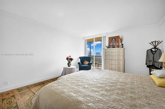 a bed room with a bed and a cabinets