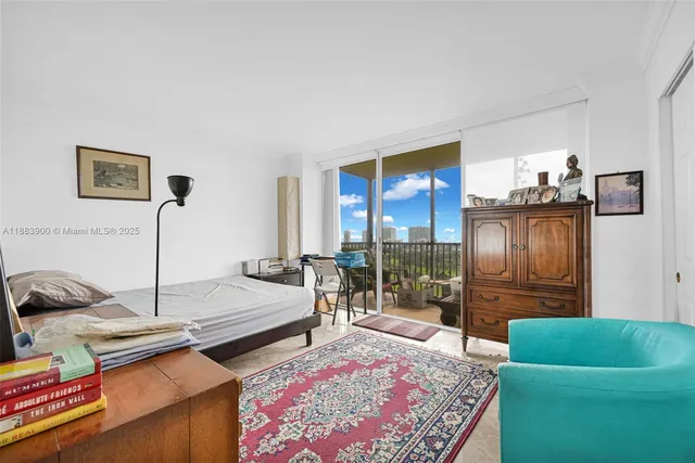 a bedroom with a bed and a dresser in it