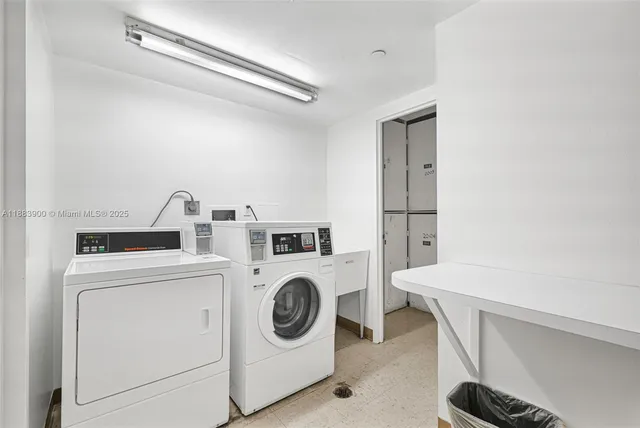 a white bathroom with shower