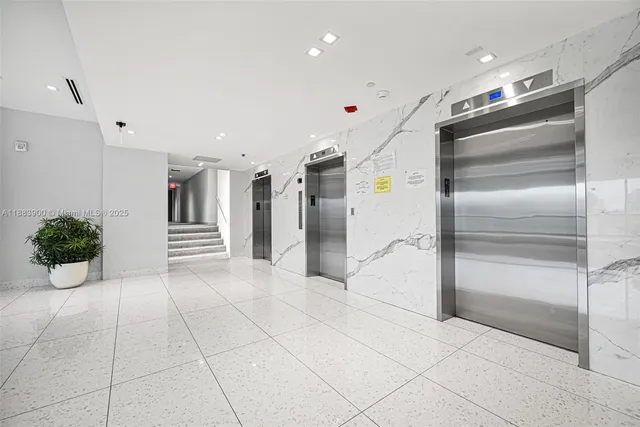 a bathroom with a tub and shower