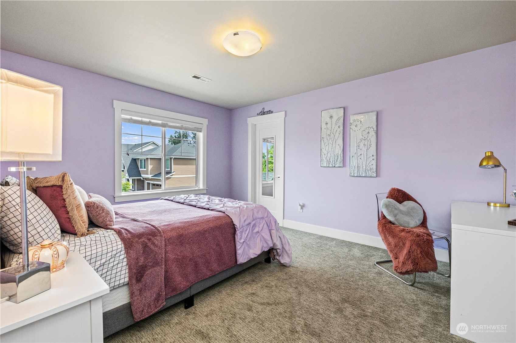 5764 Northeast 7th Court Renton, WA 98059 - Photo 22 of 40 a bedroom with a bed and furniture
