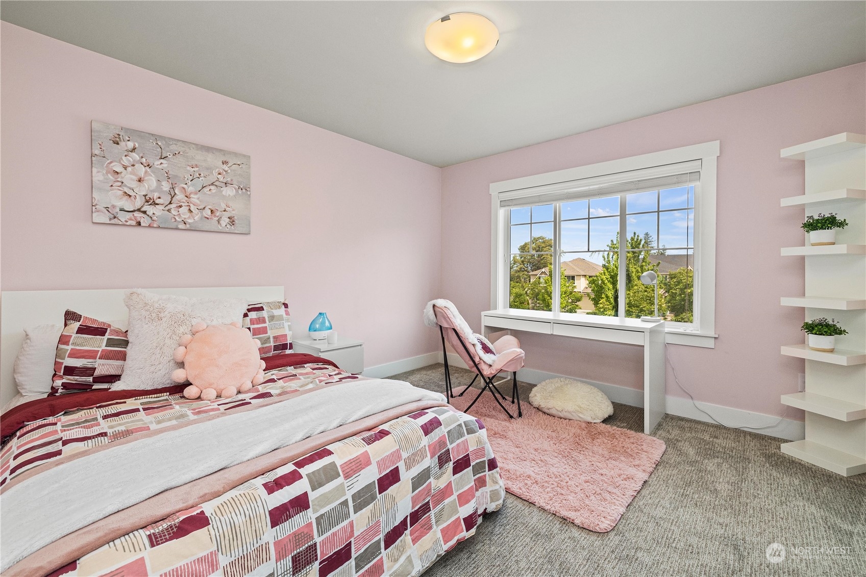 5764 Northeast 7th Court Renton, WA 98059 - Photo 25 of 40 a bedroom with a bed and a window