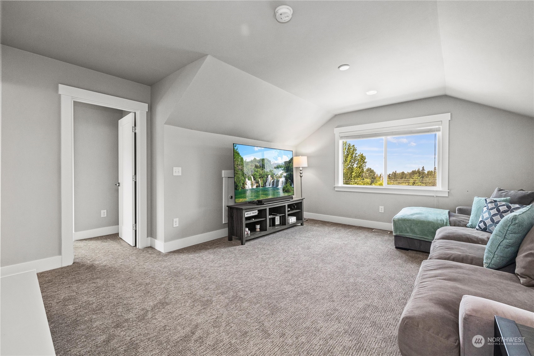 5764 Northeast 7th Court Renton, WA 98059 - Photo 28 of 40 a living room with furniture and a window