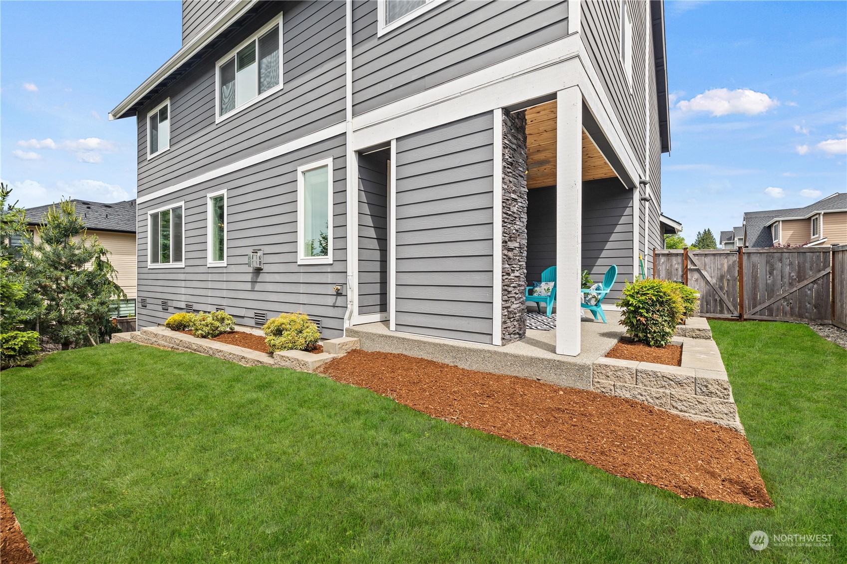 5764 Northeast 7th Court Renton, WA 98059 - Photo 35 of 40 a front view of a house with garden