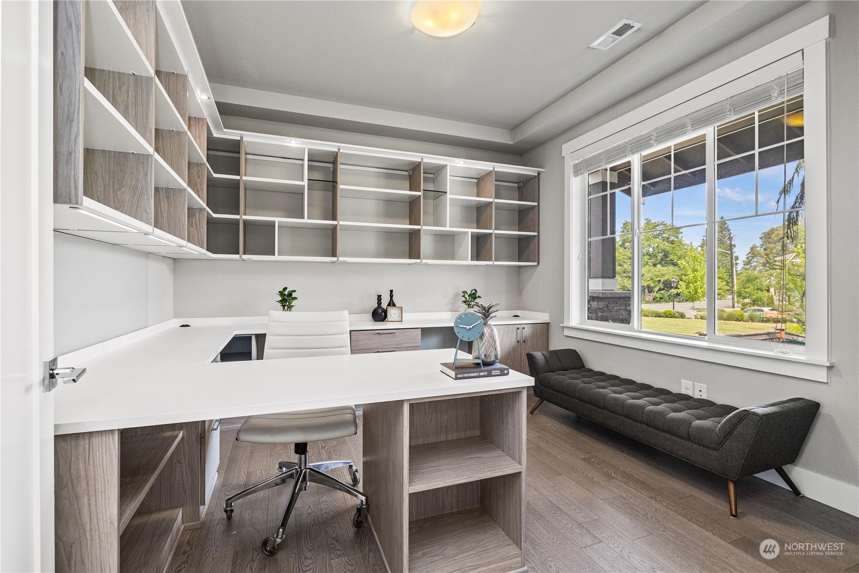 5764 Northeast 7th Court Renton, WA 98059 - Photo 5 of 40 a workspace with furniture and a large window
