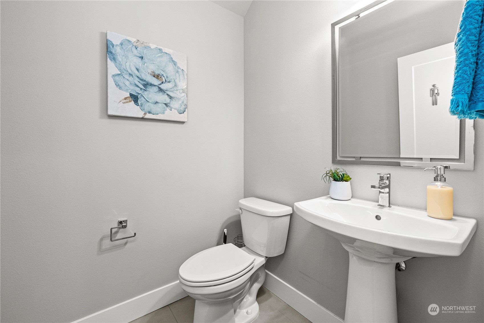 5764 Northeast 7th Court Renton, WA 98059 - Photo 7 of 40 a bathroom with a sink and a toilet