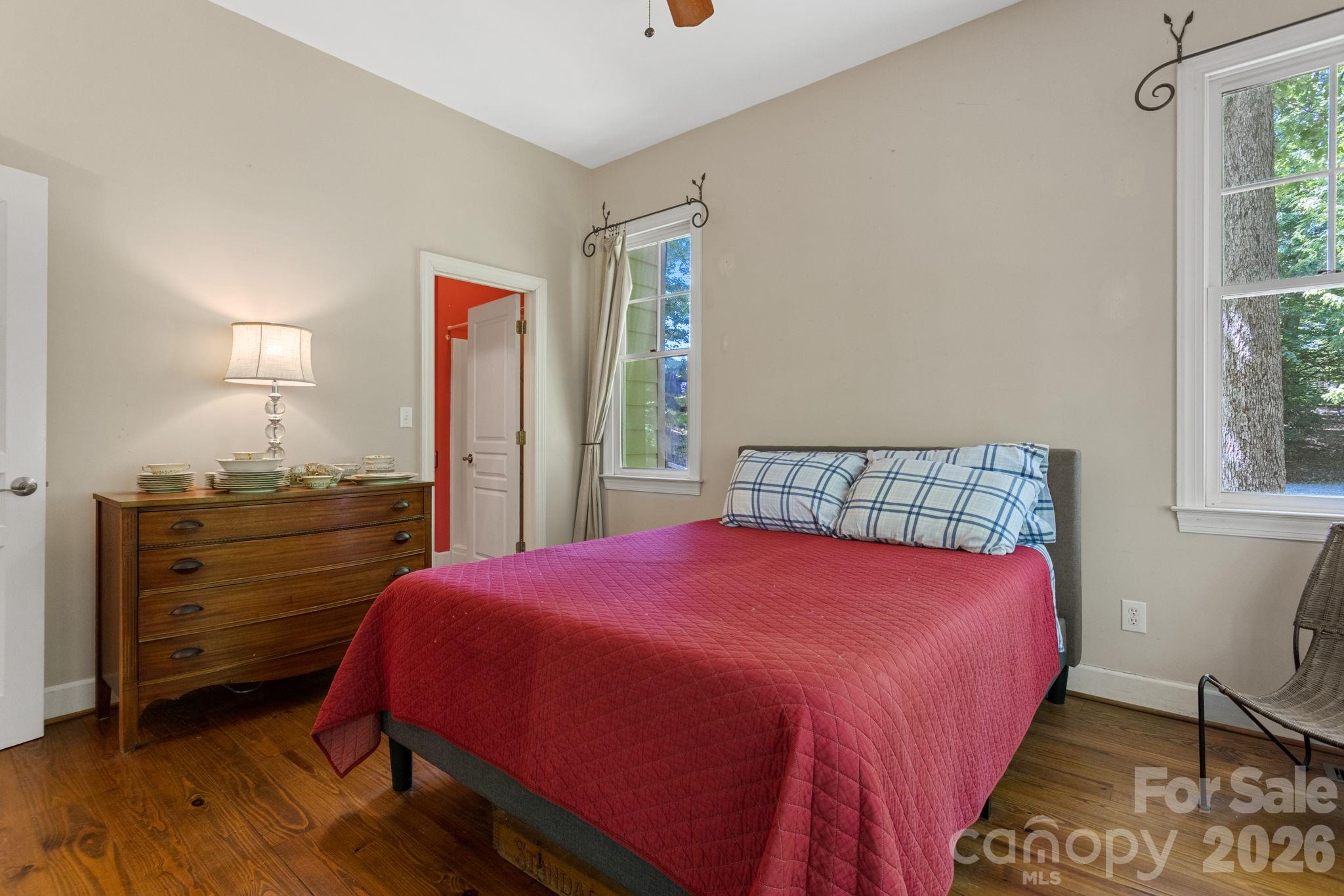 2825 Hunting Country Road Tryon, NC 28782 - Photo 18 of 41 a bedroom with a bed and a dresser