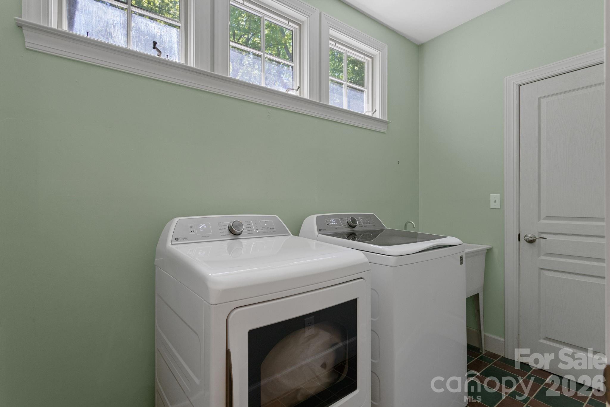 2825 Hunting Country Road Tryon, NC 28782 - Photo 24 of 41 a utility room with dryer and washer