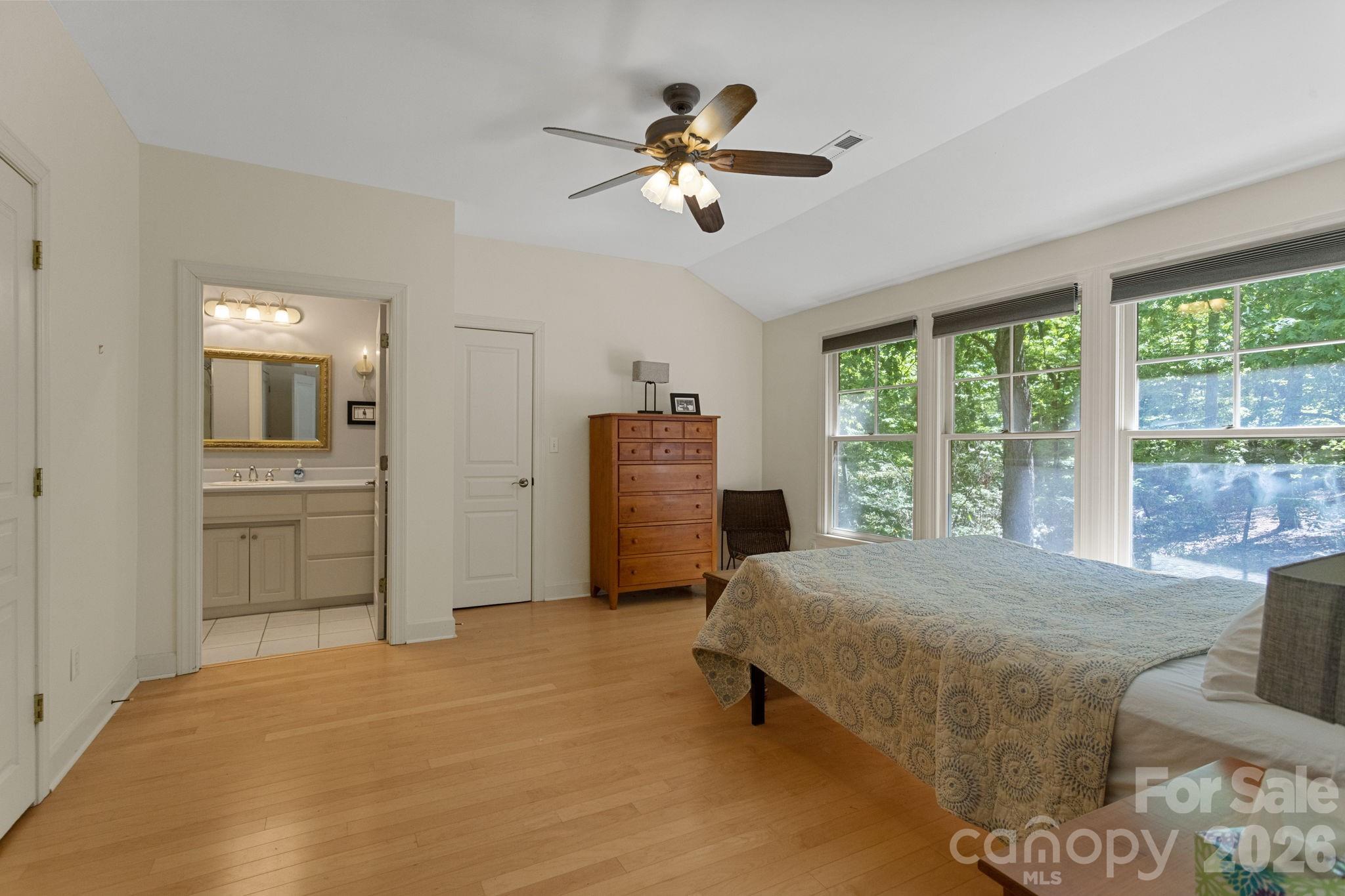 2825 Hunting Country Road Tryon, NC 28782 - Photo 25 of 41 a bedroom with a bed and window