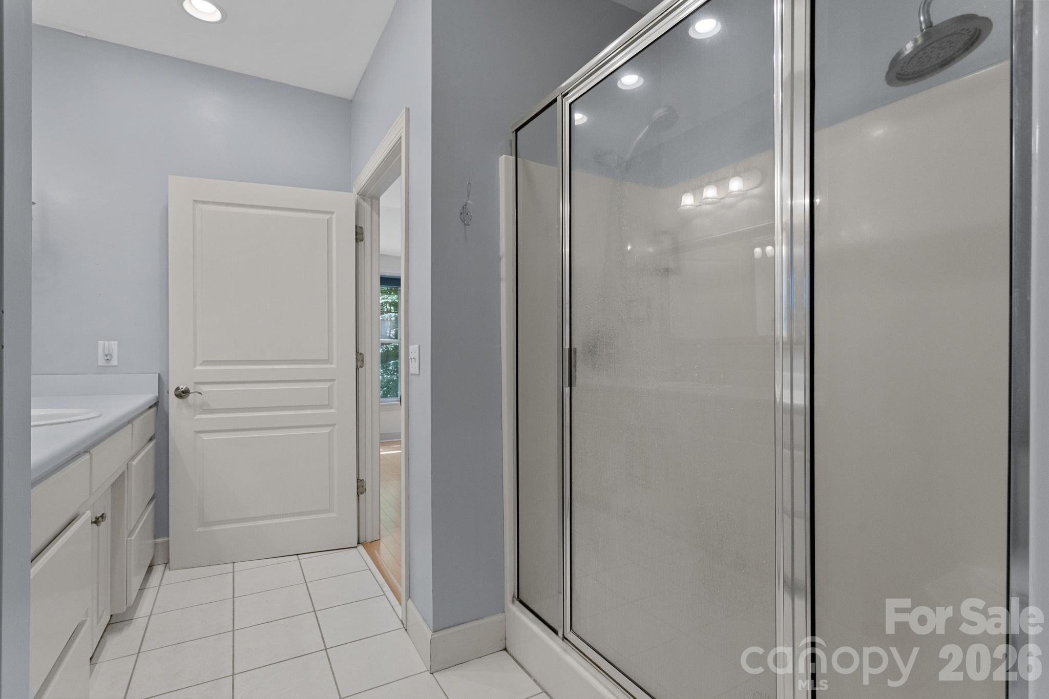 2825 Hunting Country Road Tryon, NC 28782 - Photo 29 of 41 a bathroom with a shower and a sink