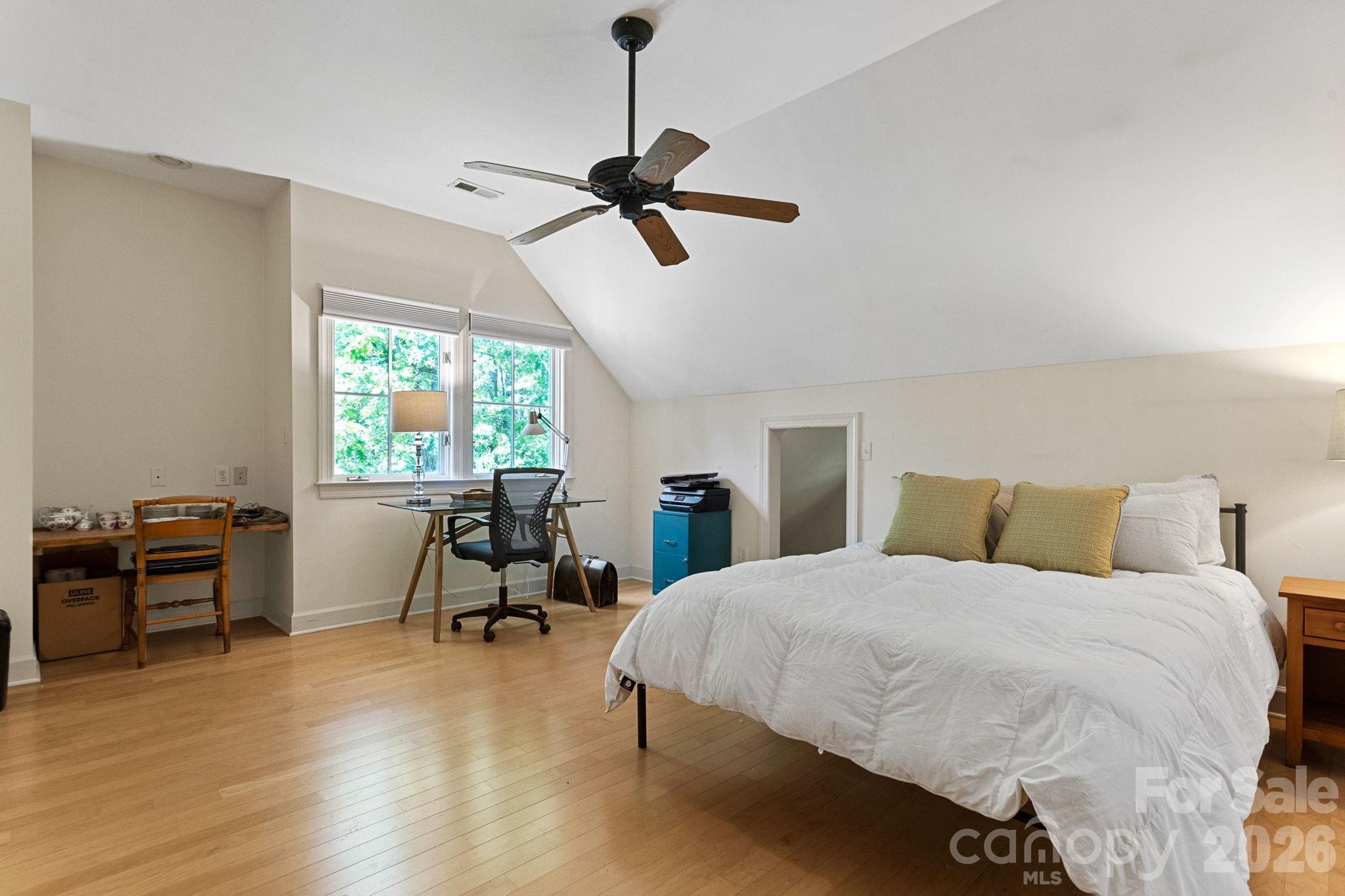 2825 Hunting Country Road Tryon, NC 28782 - Photo 33 of 41 a bedroom with a bed and furniture