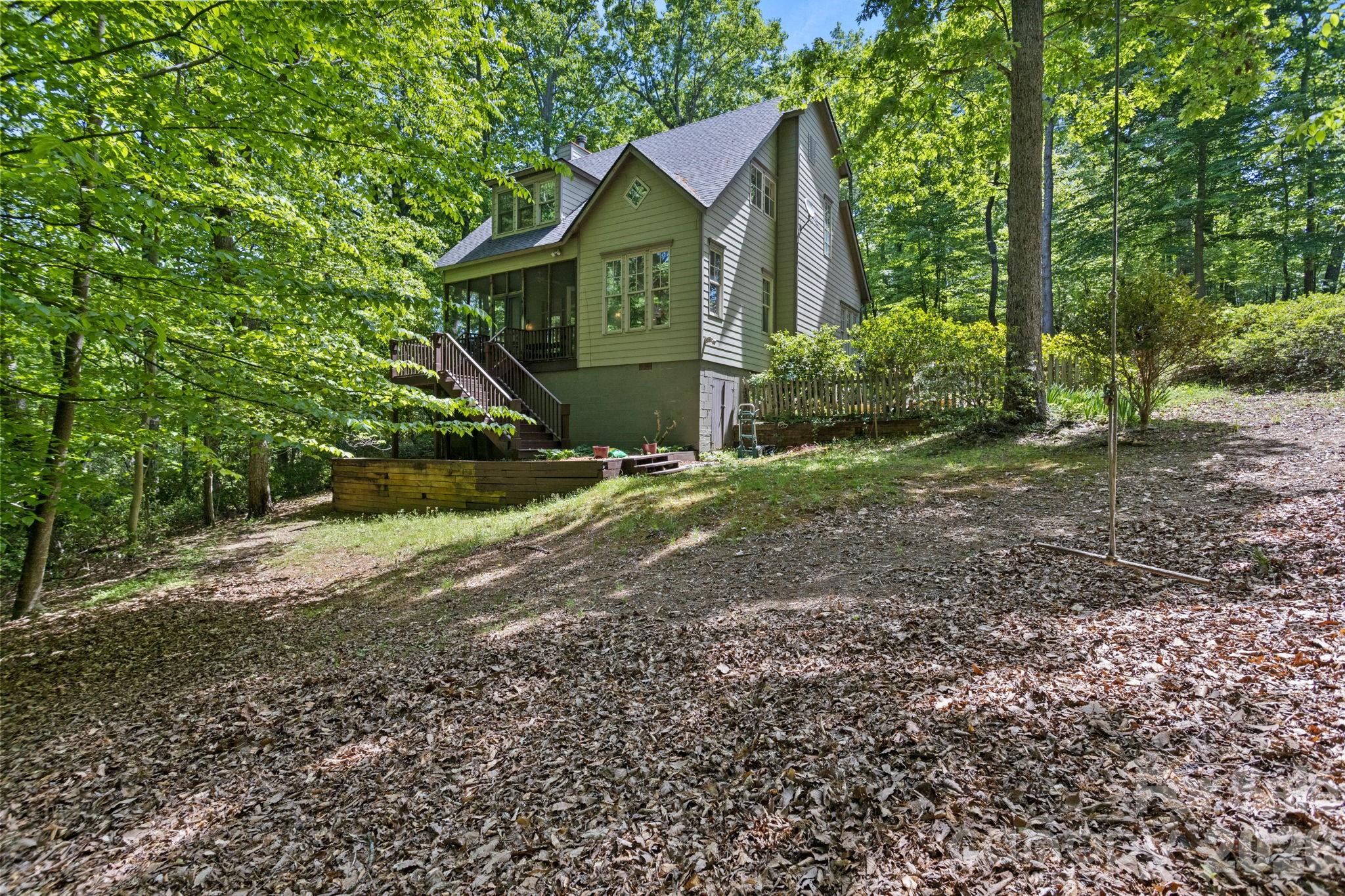 2825 Hunting Country Road Tryon, NC 28782 - Photo 38 of 41 a view of a back yard of the house