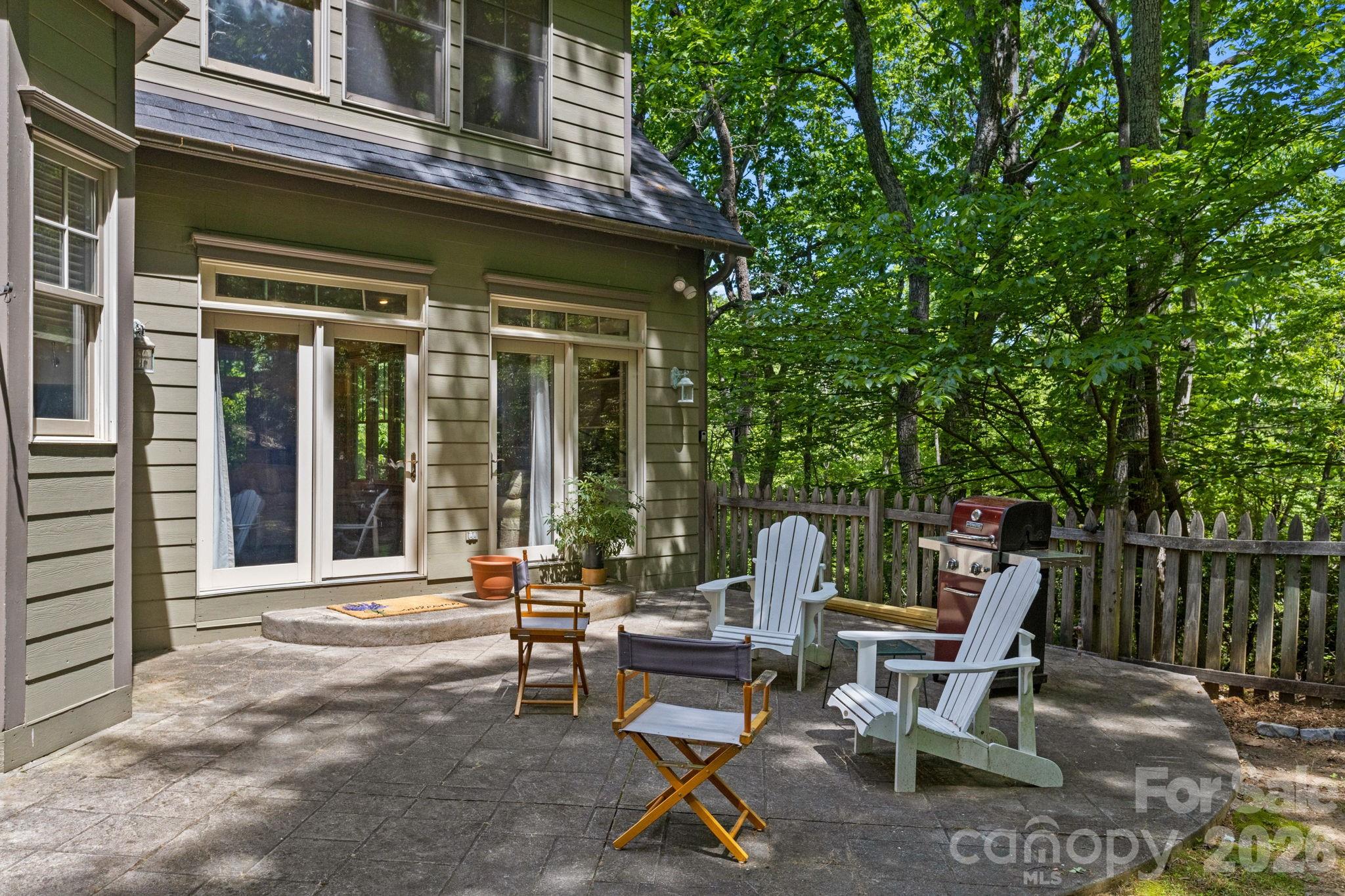 2825 Hunting Country Road Tryon, NC 28782 - Photo 5 of 41 a view of a lounge chair in the patio of the house