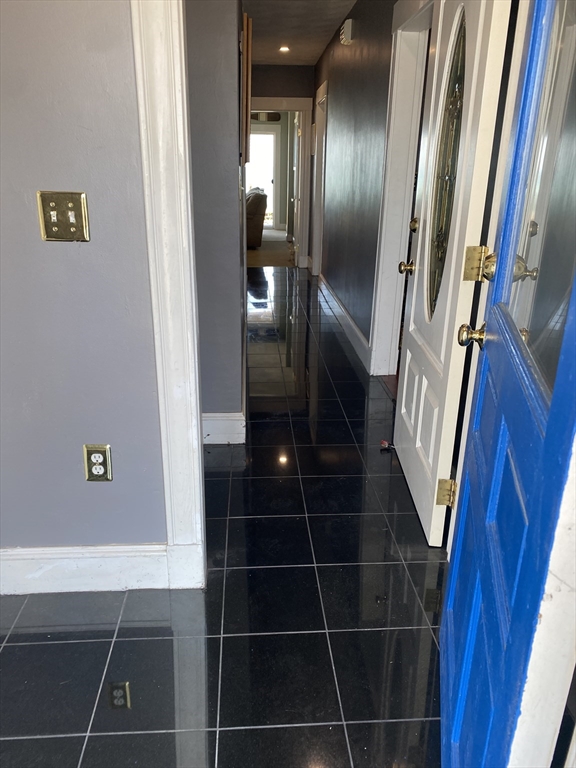 876 Shirley Street, Unit 1 Winthrop, MA 02152 - Photo 2 of 14 a bathroom with a shower and toilet