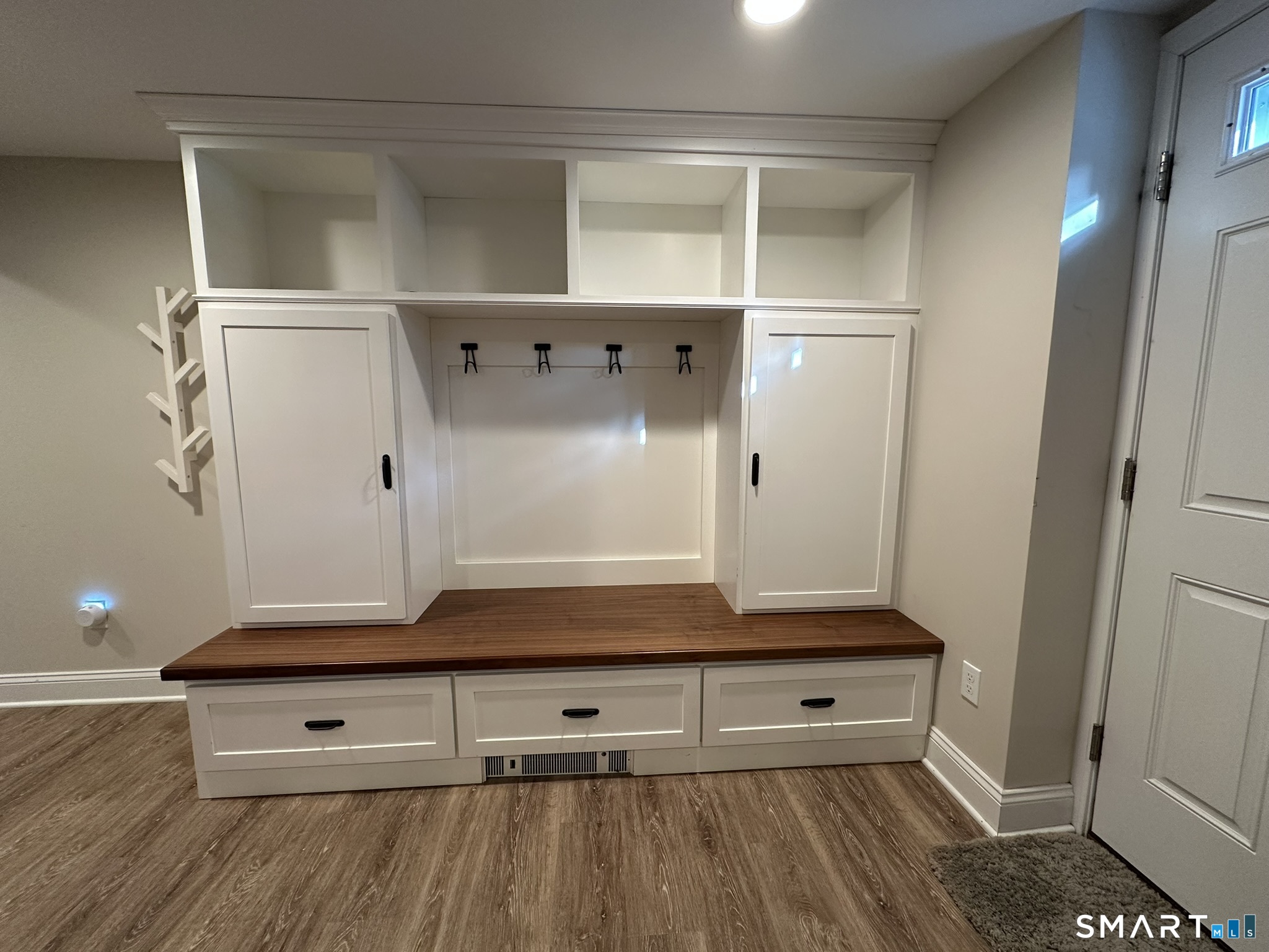 2 Hurd Street Shelton, CT 06484 - Photo 7 of 19 Gorgeous entryway built-in bench with coat rack and storage.
