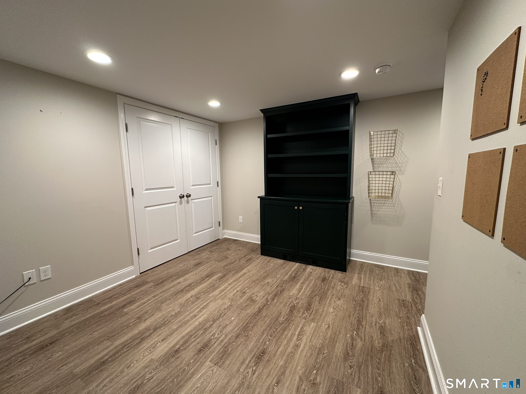 2 Hurd Street Shelton, CT 06484 - Photo 9 of 19 Open room, connecting Living Room to bathroom and bedroom, ideal for office, den, music or hobby room.