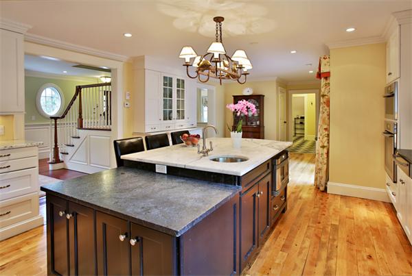 4 Nobscot Road Newton, MA 02459 - Photo 8 of 17 a kitchen with a counter space a sink and living room view