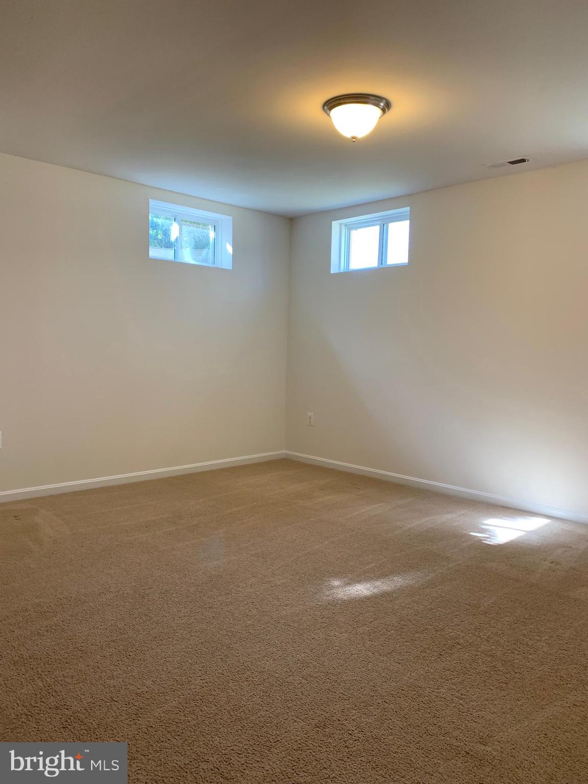 17269 Library Boulevard Ruther Glen, VA 22546 - Photo 14 of 14 a view of an empty room and window