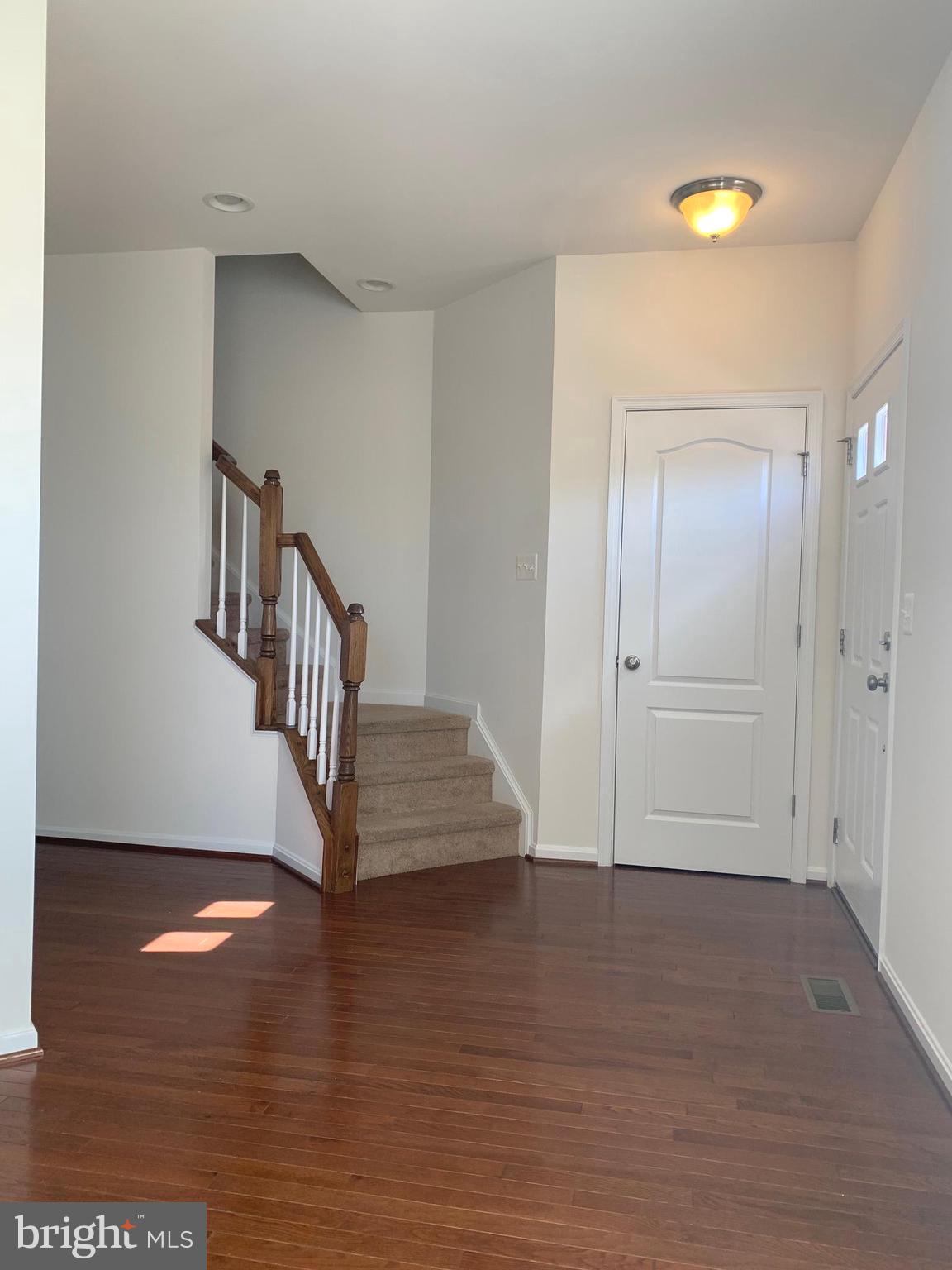 17269 Library Boulevard Ruther Glen, VA 22546 - Photo 2 of 14 a view of entryway with wooden floor