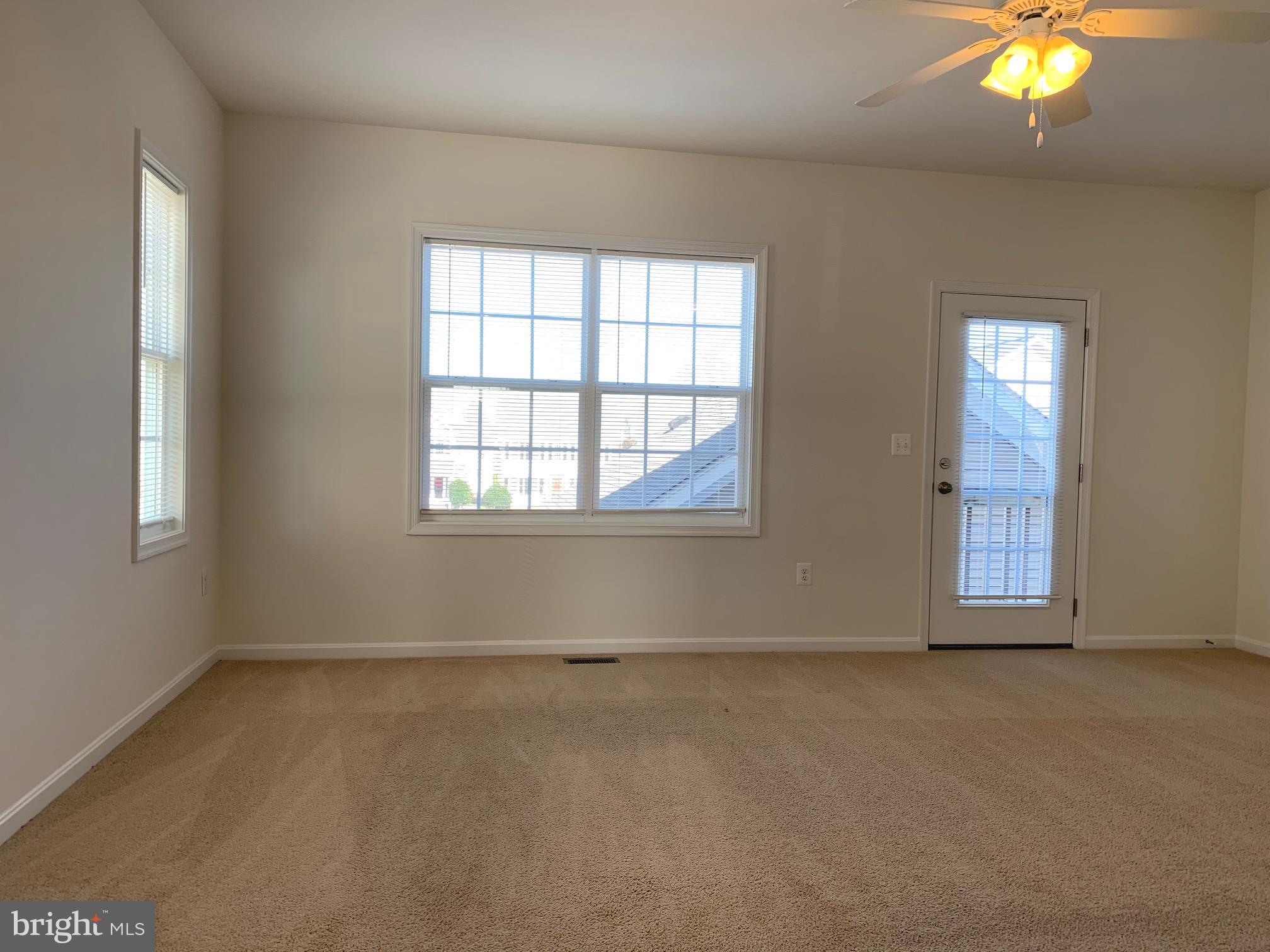 17269 Library Boulevard Ruther Glen, VA 22546 - Photo 7 of 14 an empty room with window