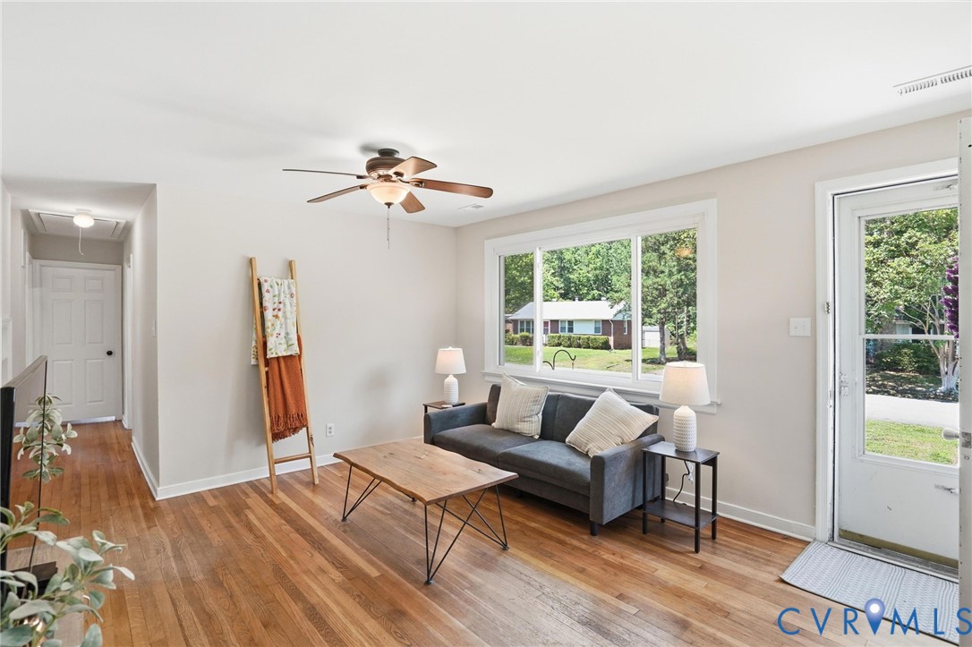 2403 Omega Road Henrico, VA 23228 - Photo 6 of 39 a living room with furniture and a large window