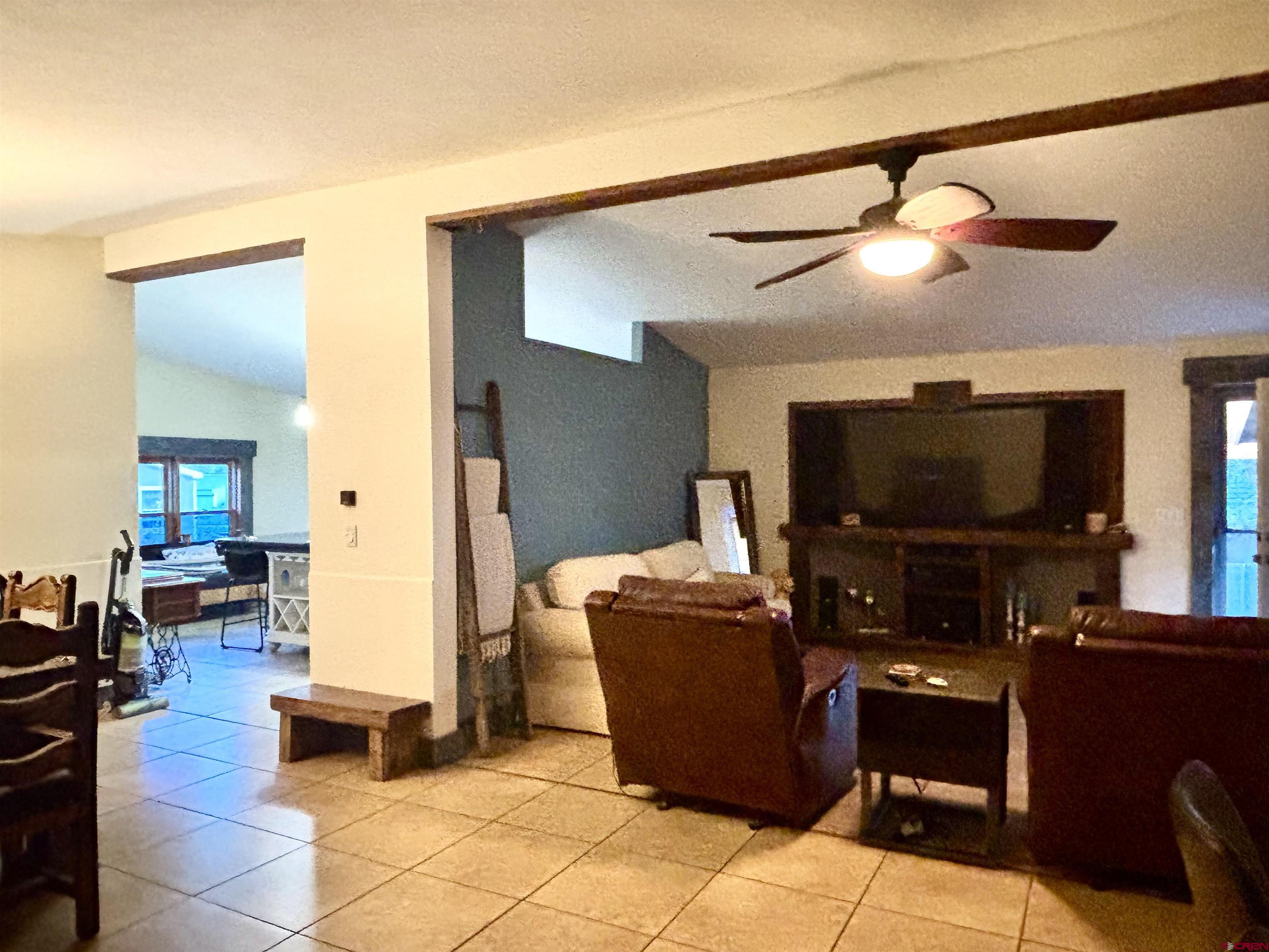 28 Raspberry Circle Durango, CO 81301 - Photo 11 of 26 a living room with furniture and a flat screen tv