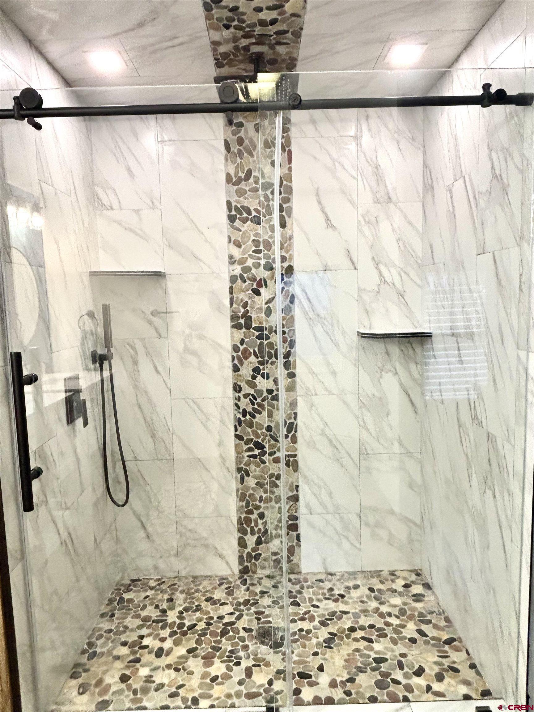 28 Raspberry Circle Durango, CO 81301 - Photo 14 of 26 a bathroom with a shower