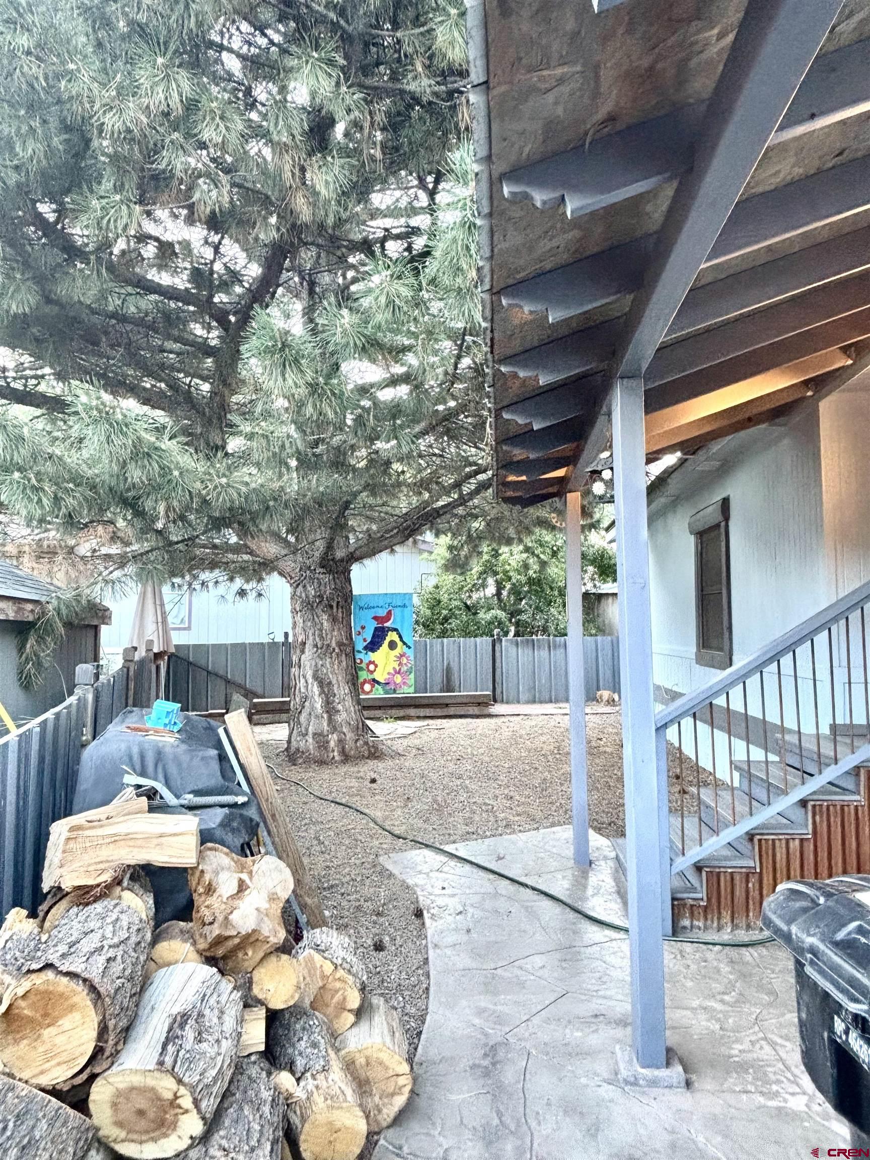 28 Raspberry Circle Durango, CO 81301 - Photo 4 of 26 a front view of a house with a yard