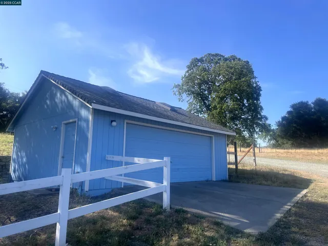 a house with trees in front of it
