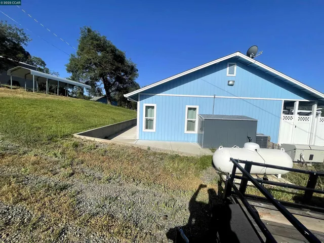 a view of a city with large trees
