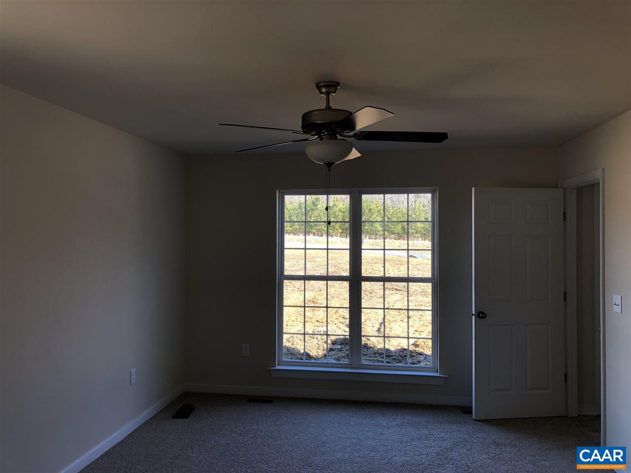987 Deep Creek Road Palmyra, VA 22963 - Photo 4 of 8 a view of an empty room and window