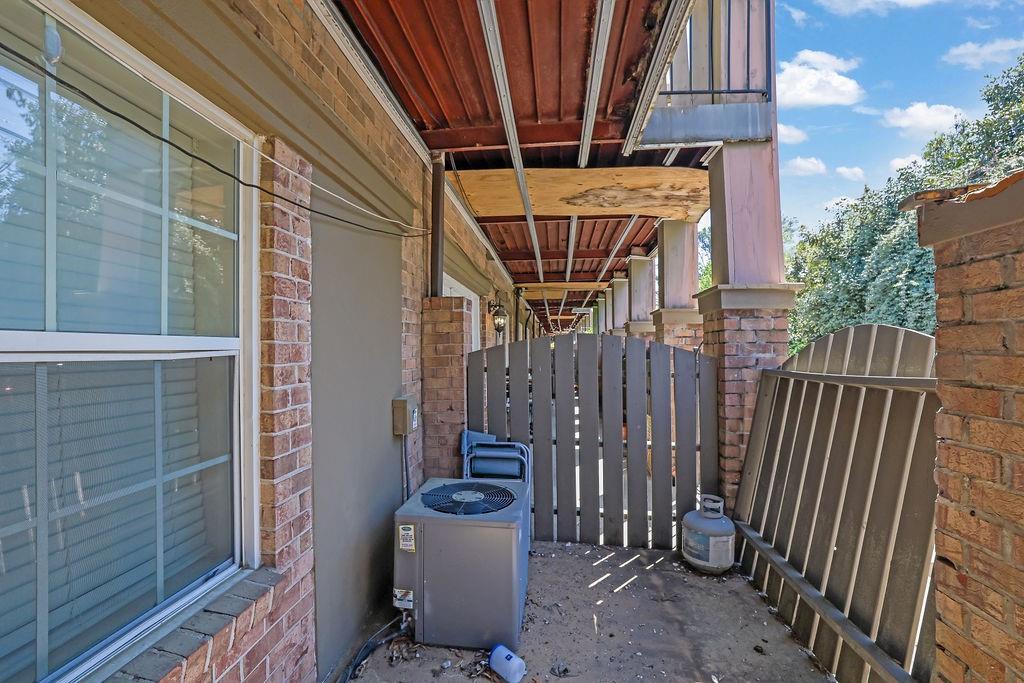 6980 Roswell Road, Unit B11 Atlanta, GA 30328 - Photo 12 of 14 a view of an outdoor space with wooden deck