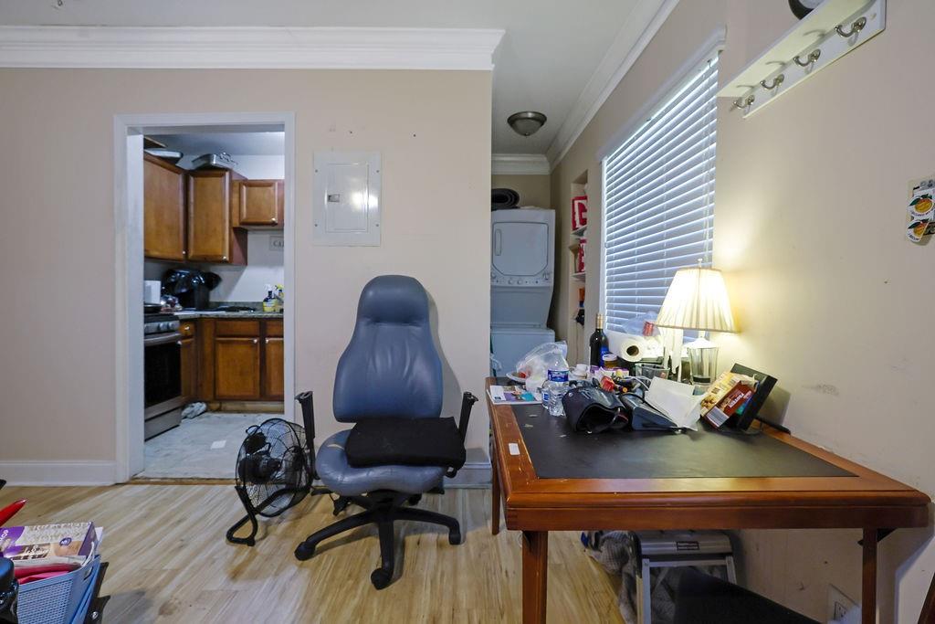 6980 Roswell Road, Unit B11 Atlanta, GA 30328 - Photo 7 of 14 a view of a workspace with furniture and a window